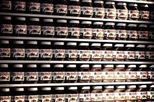 Jars of Nutella lined up in a shop